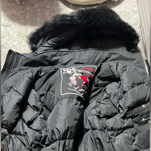 Moose Knuckles Black Jacket with Embroidered Hockey Patch